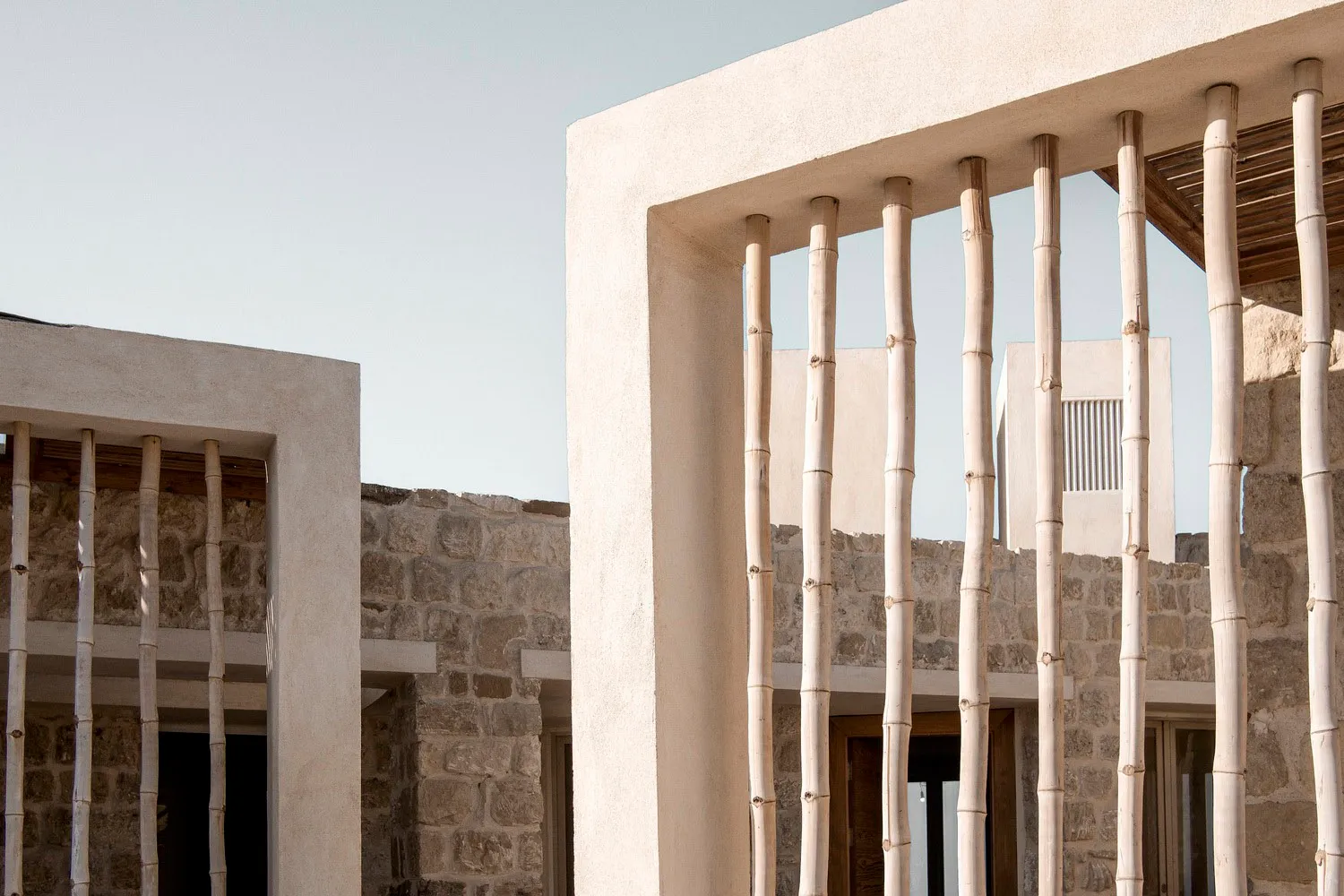 Concrete columns and walls of a contemporary architectural structure.