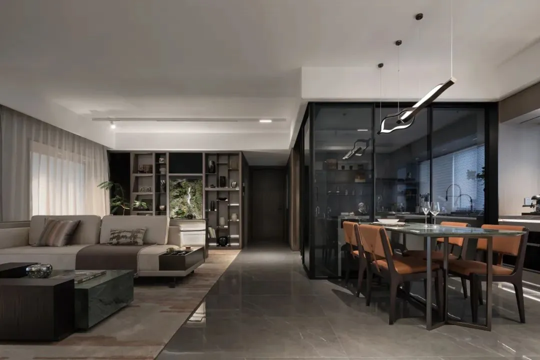Modern living room featuring metallic furniture and decor.