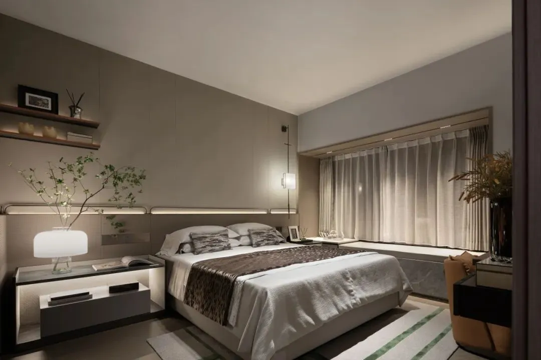 A well-lit, modern minimalist bedroom with a king-sized bed adorned with a gray and black striped duvet and pillows, accompan