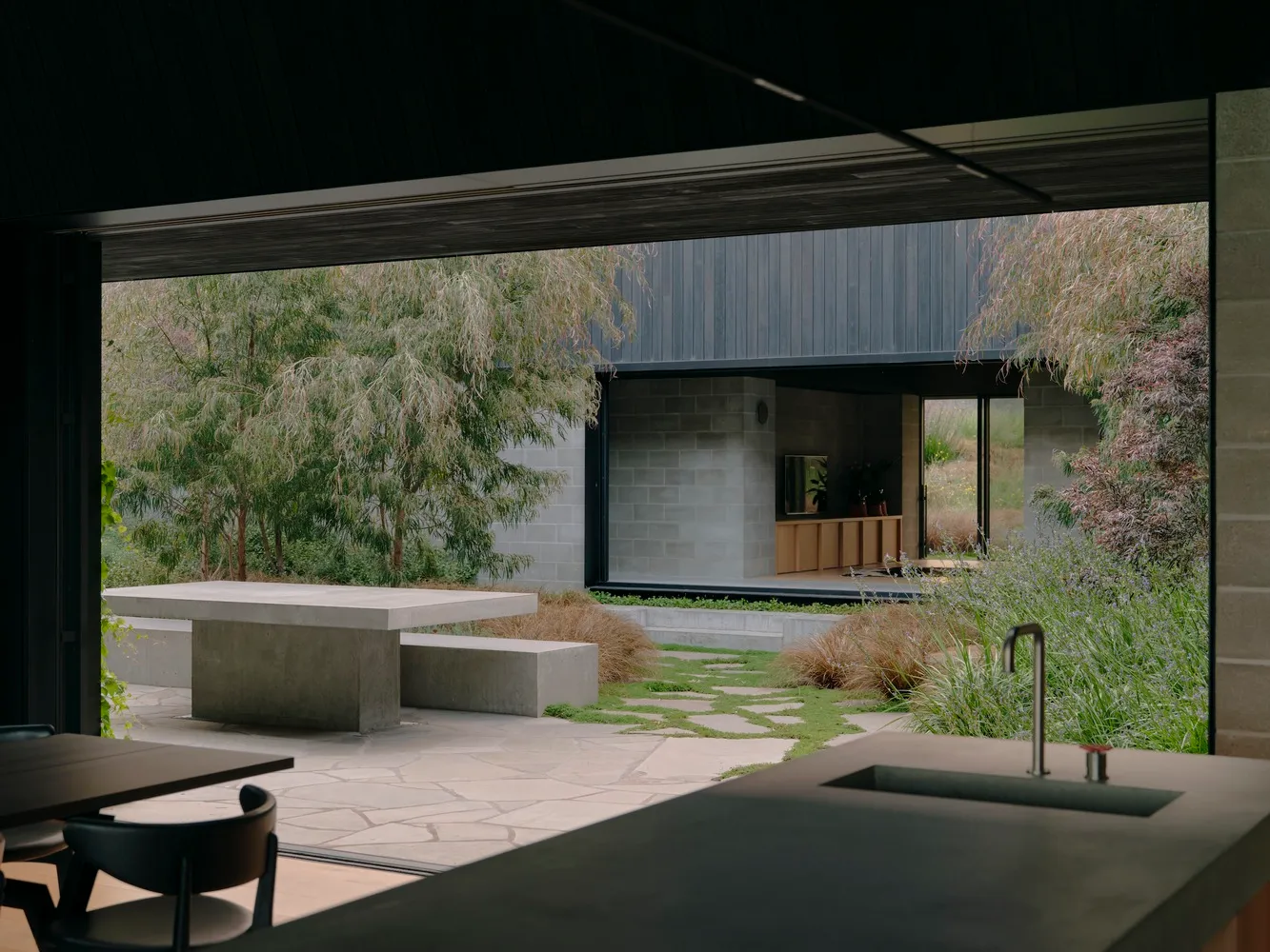 Modern exterior building with concrete and glass materials.