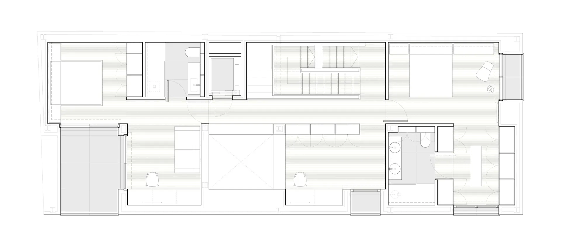 A modern residential floor plan showing wooden flooring and minimalist design.