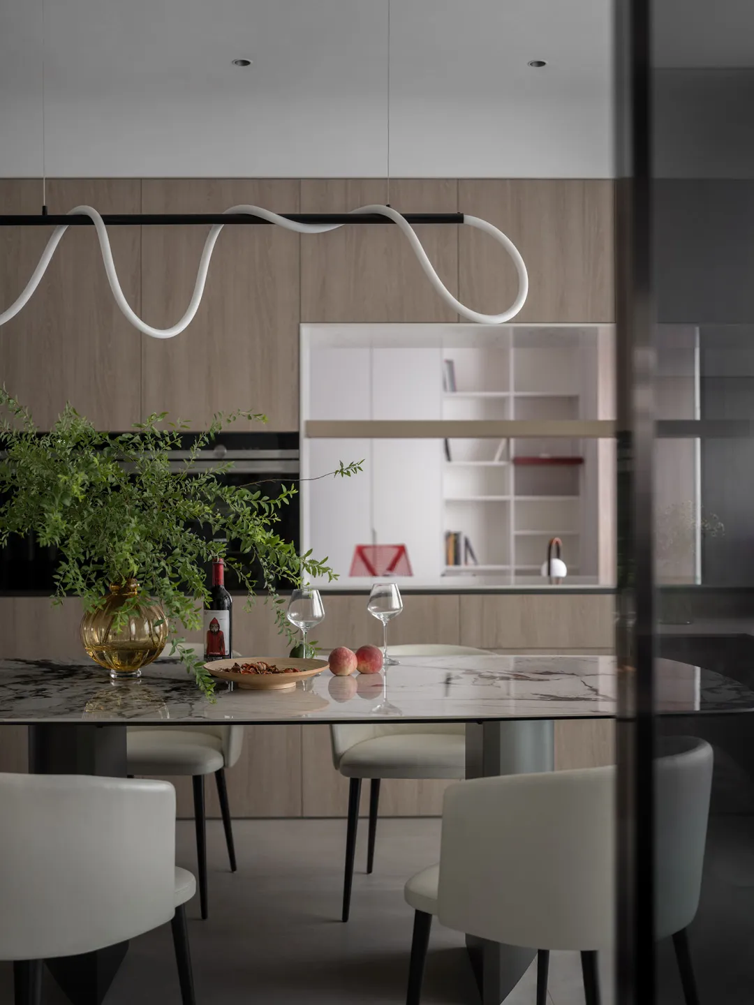 Modern dining room with marble table and minimalist design