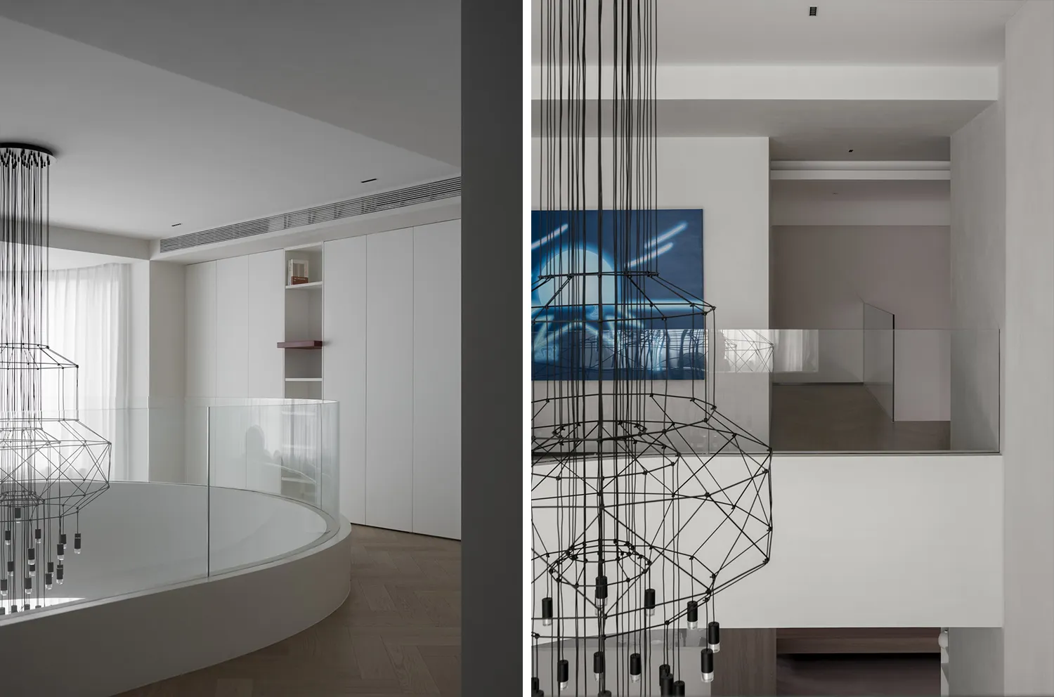 Modern residential interior featuring glass and metal materials and minimalist design.
