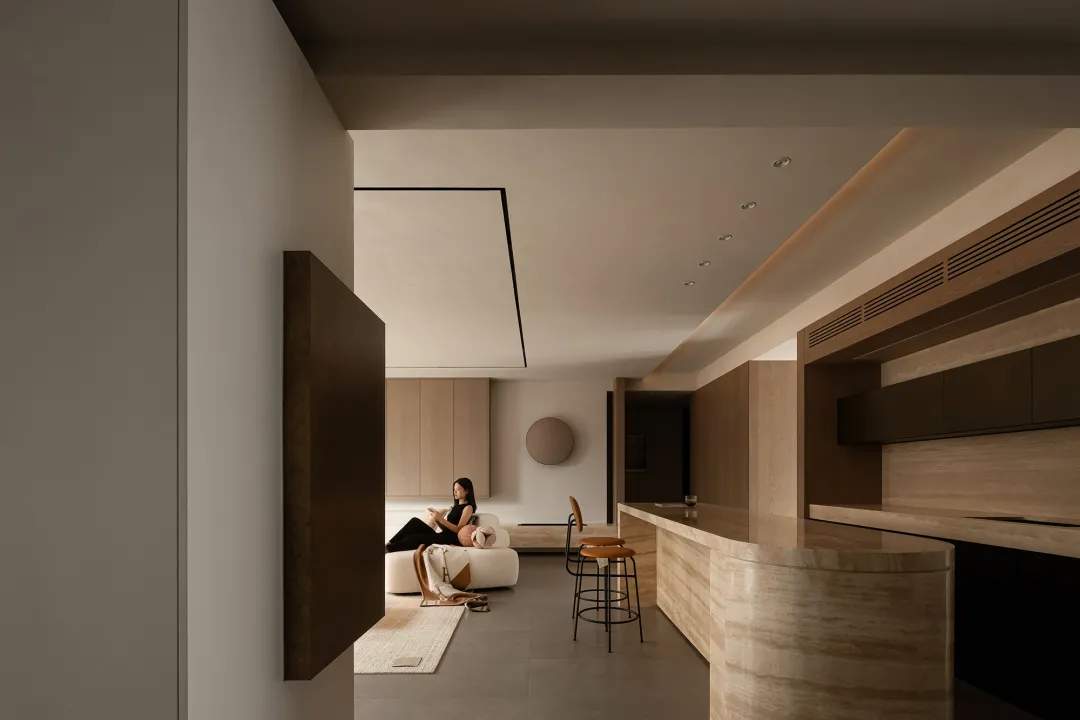 A modern living room featuring marble and wooden elements.