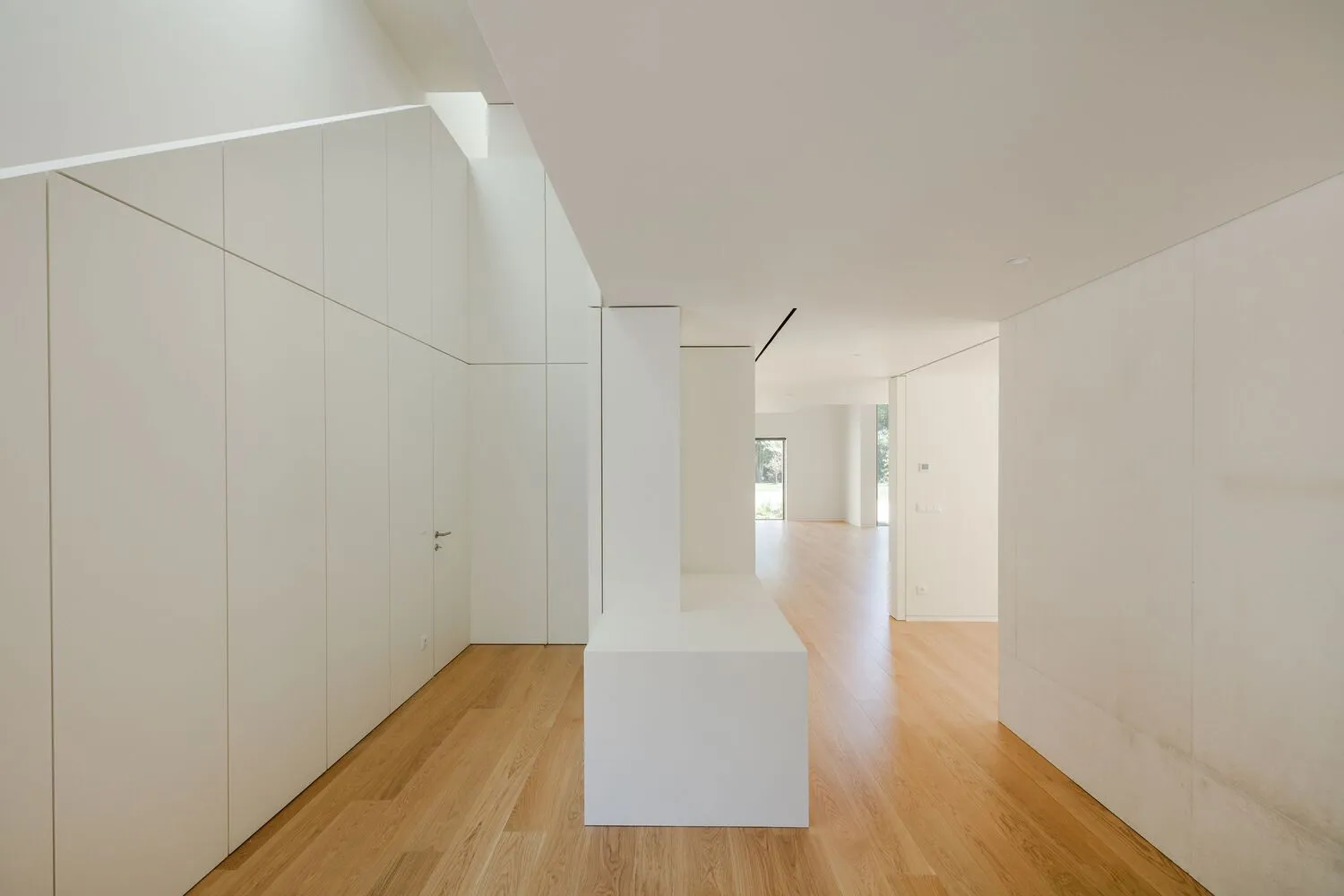 Modern interior design featuring wooden flooring in a floor plan layout.