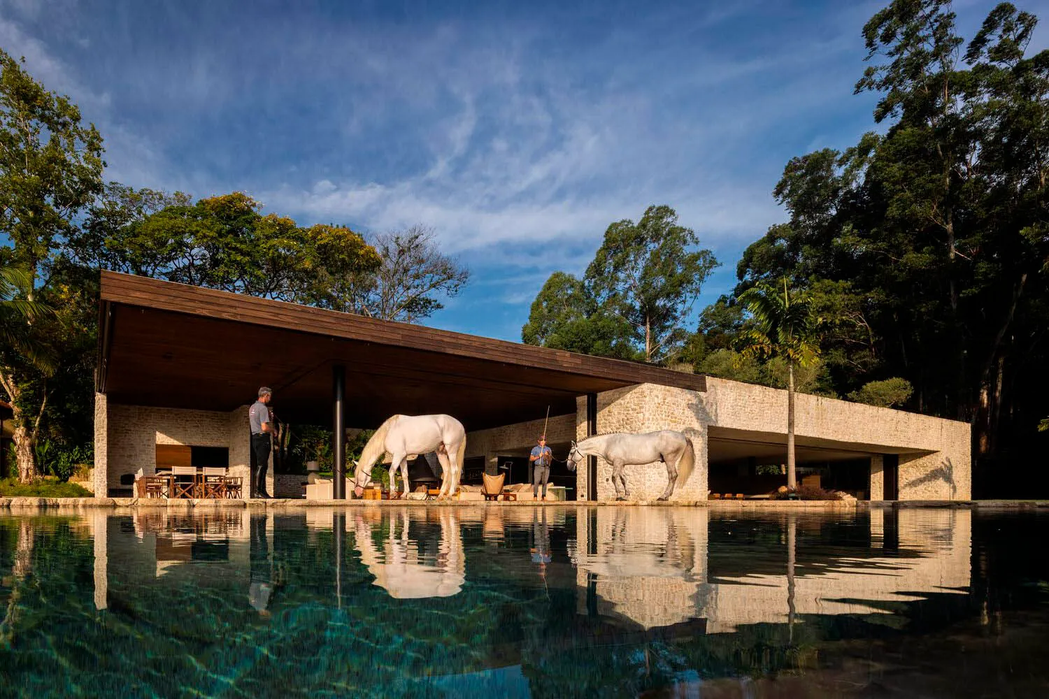 Modern architectural exterior featuring stone and concrete materials