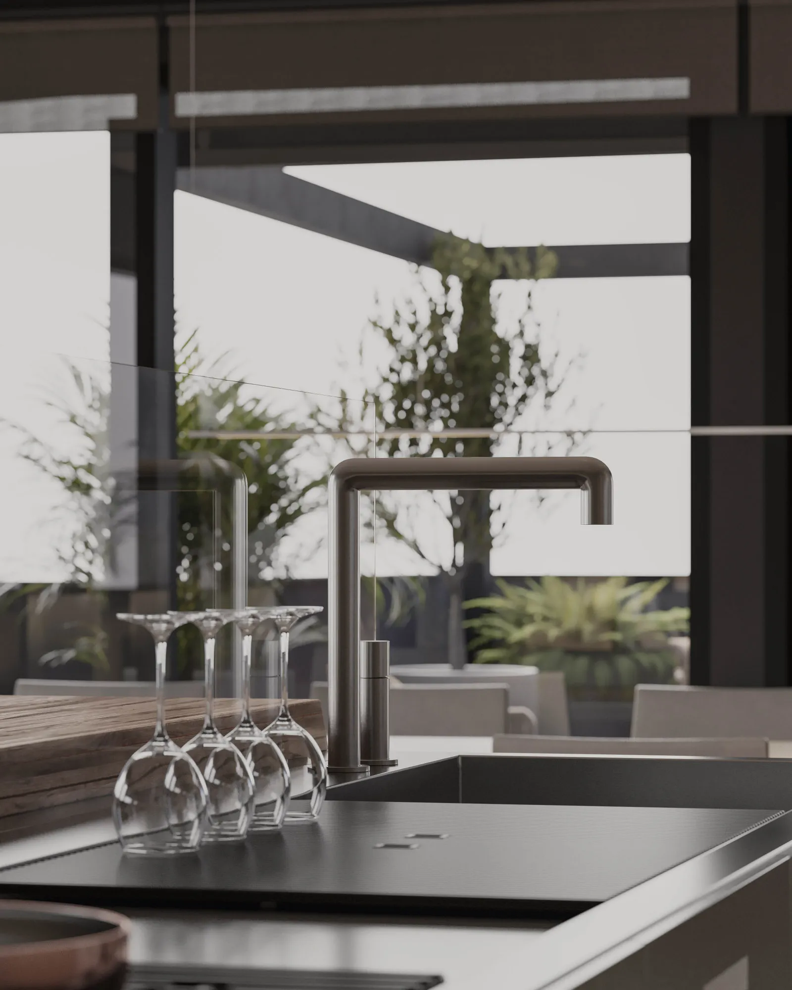 Modern interior kitchen with metallic faucet and glasses.