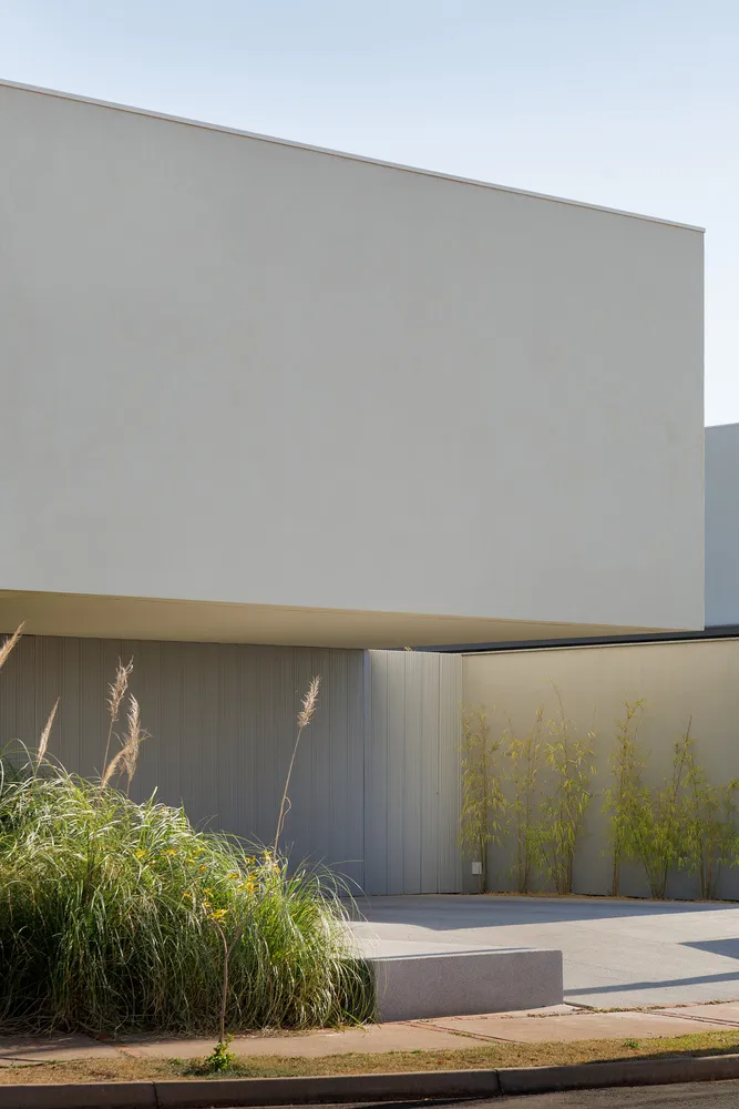A modern minimalist building with a concrete facade.