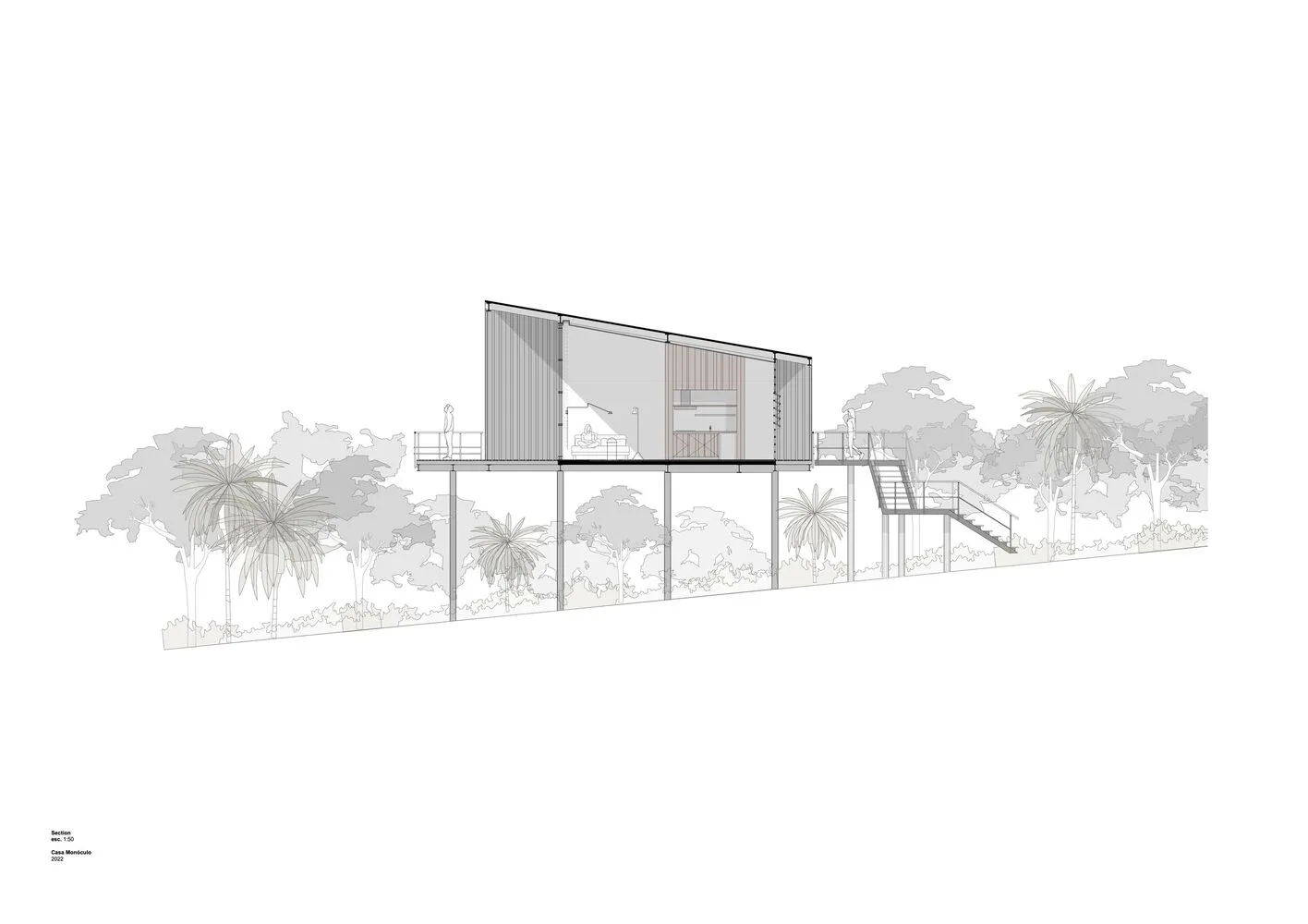 A modern house with a metal exterior and large glass windows.