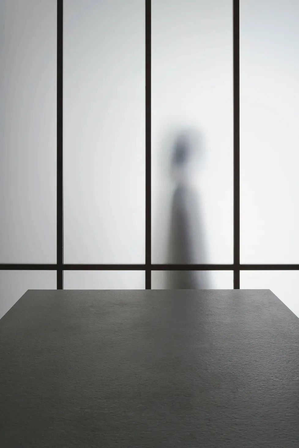 A minimalist modern glass window design showcasing sleek, transparent glass panels.
