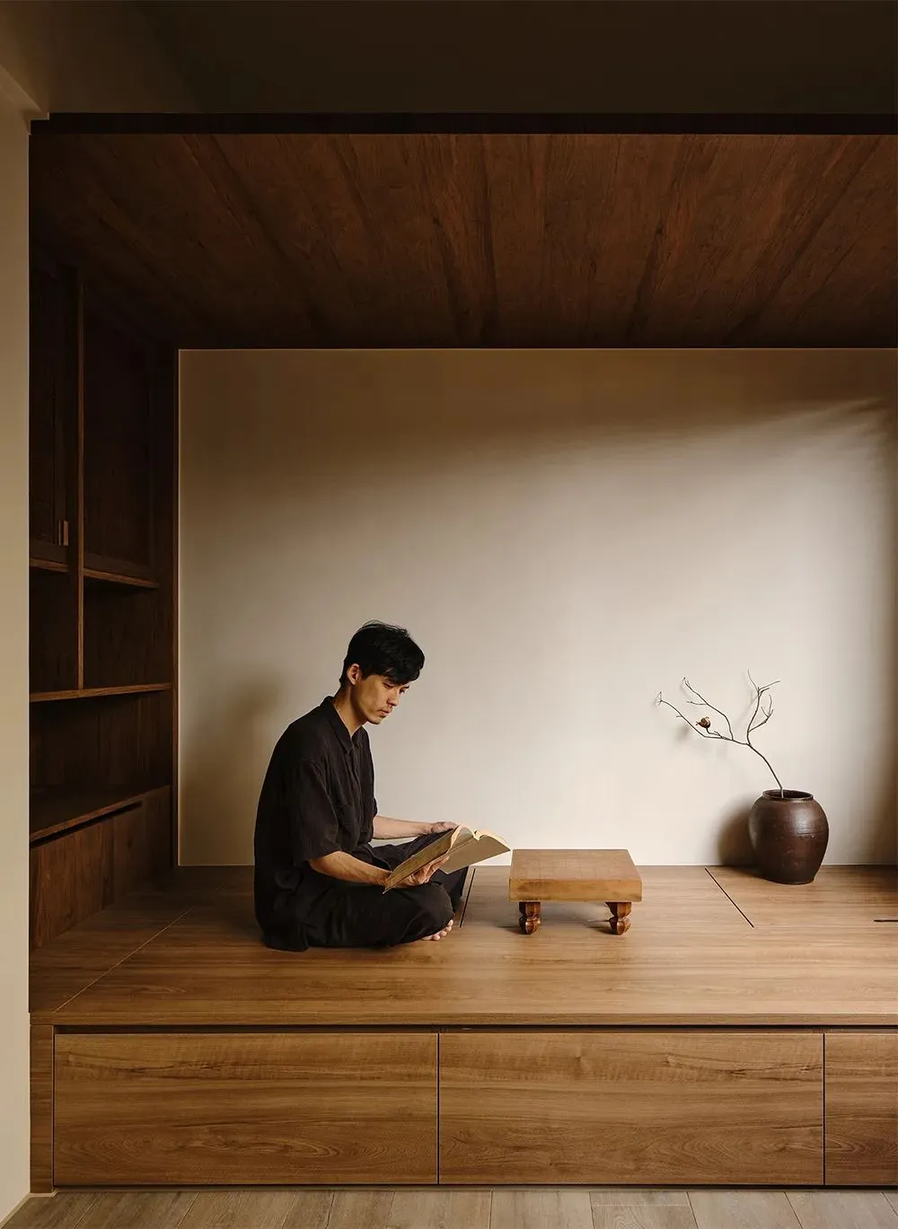 A minimalist living room featuring wooden elements