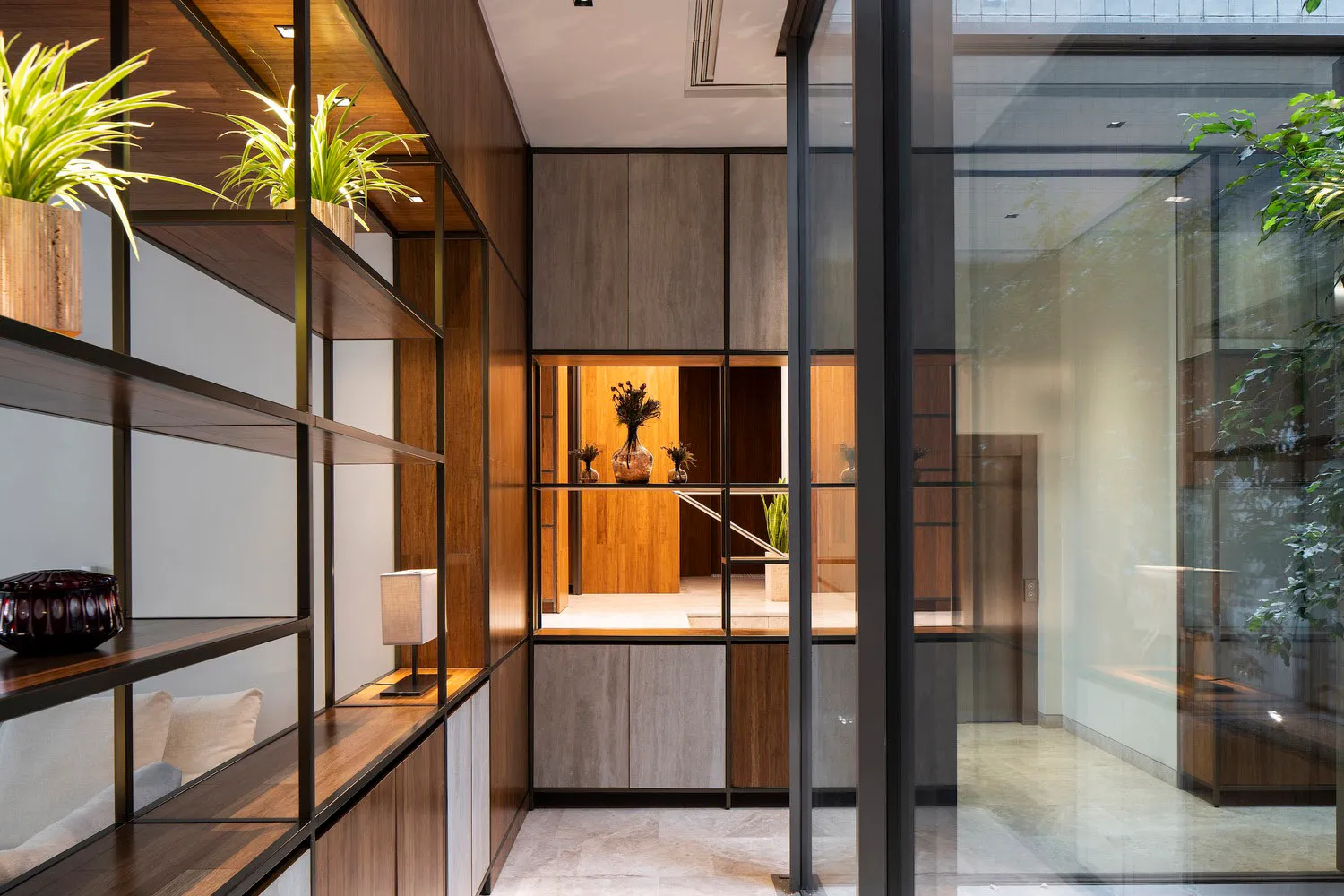 Modern living room with wooden accents and green plants