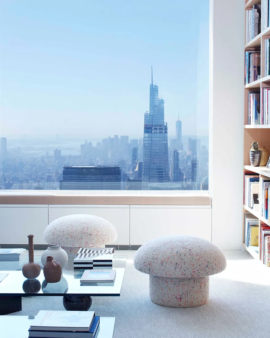 Modern residential interior with a concrete floor and minimalist decor.