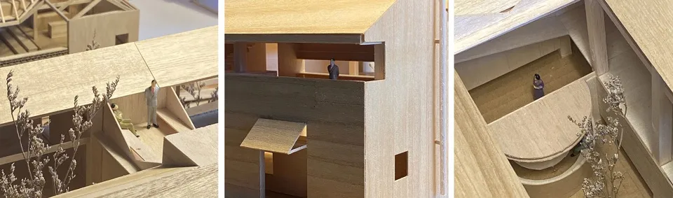 木質結構的3D建築模型，搭配小型人偶代表人物。