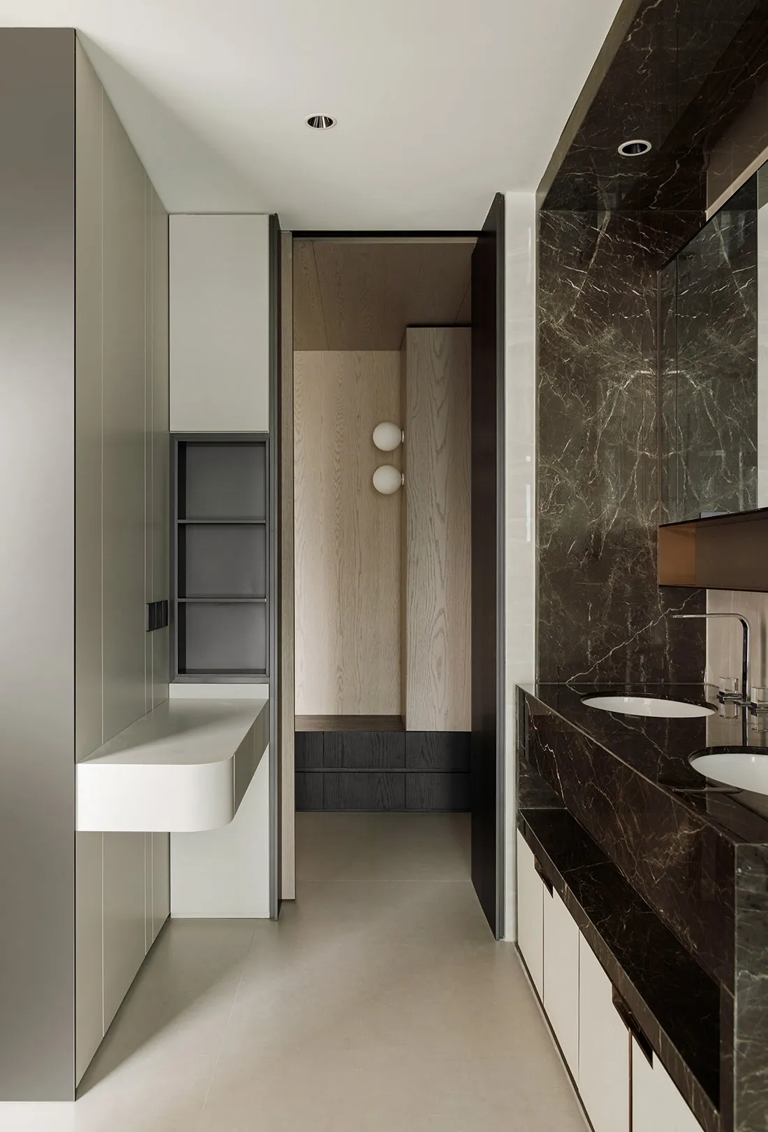 Modern bathroom interior featuring marble, concrete, and wooden elements.