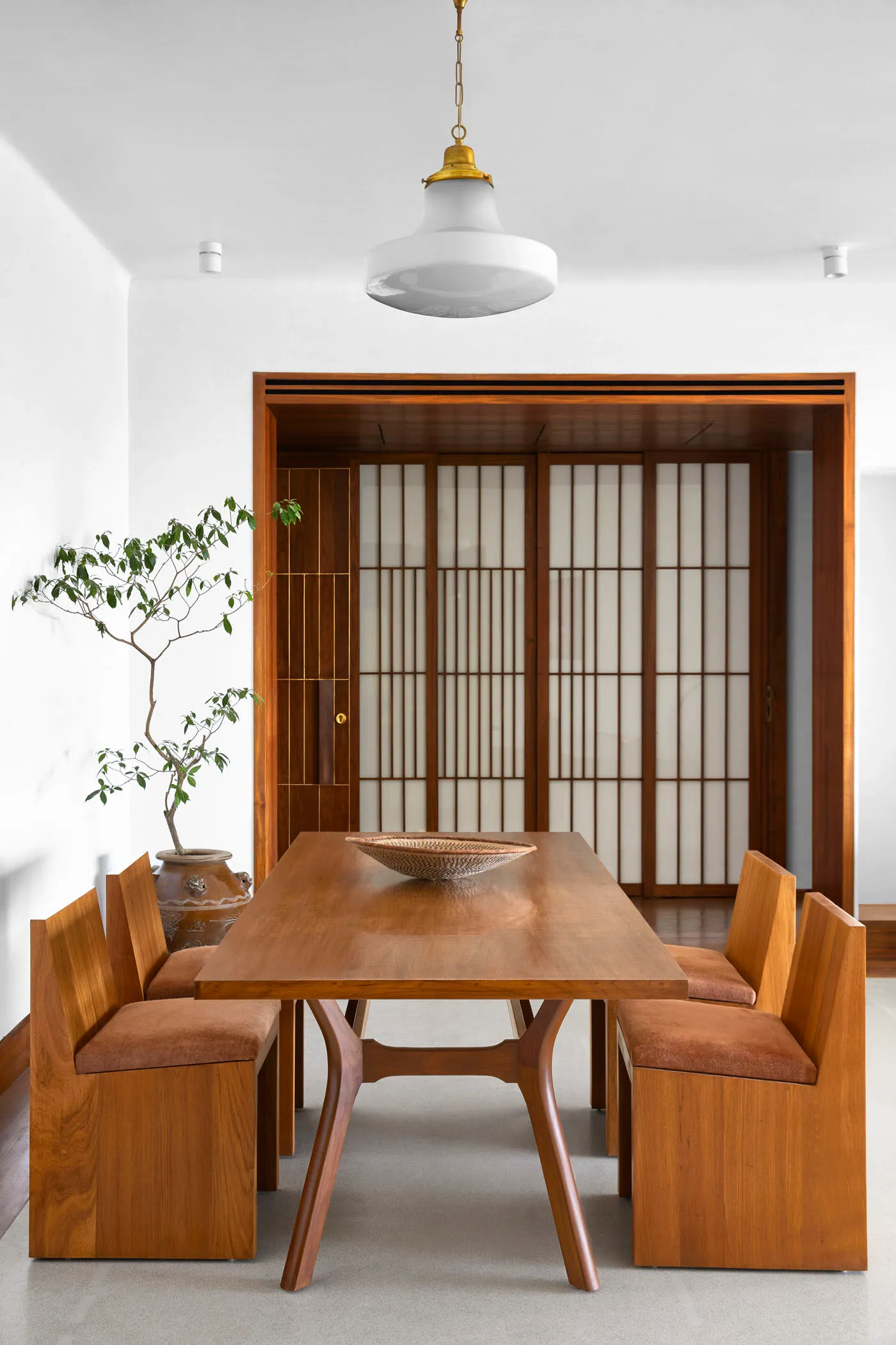 Modern dining room featuring wooden furniture