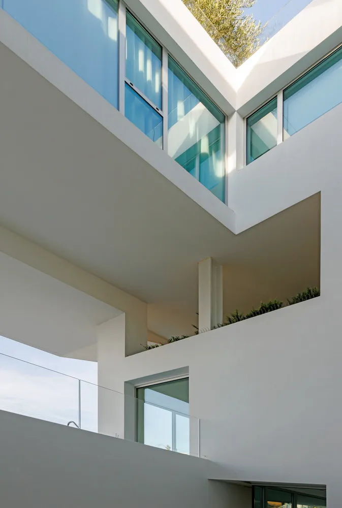 Modern building exterior featuring minimalist design and concrete materials