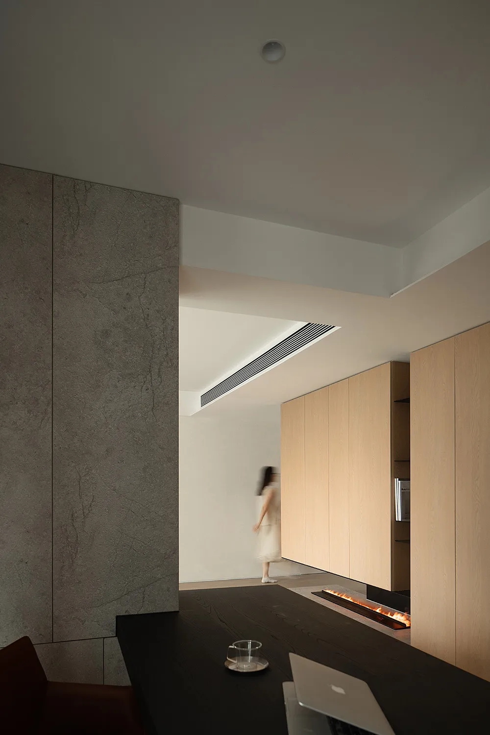 Modern living room with concrete and wood materials