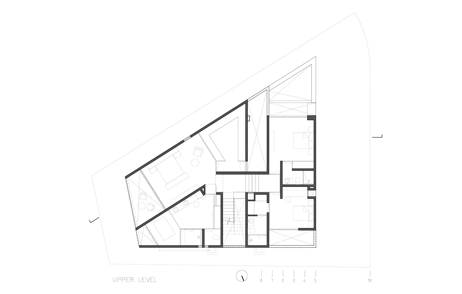 現代上層空間的平面圖，展示已配置家具的房間與建築細節。