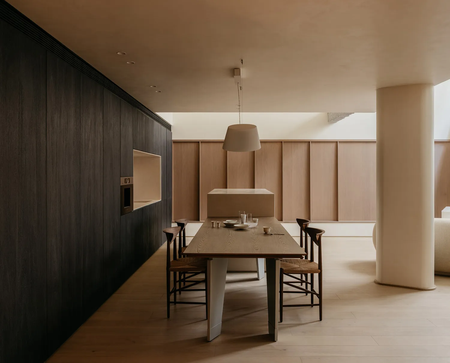 Modern dining room with wooden table and chairs