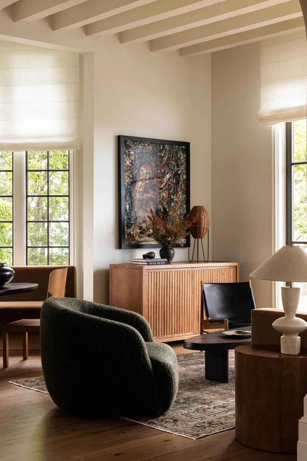 Modern living room featuring wooden framed furniture and upholstered with wool.