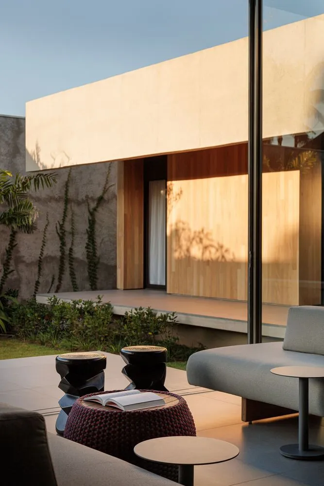 Modern living room featuring concrete and wooden materials with a sleek, contemporary design.