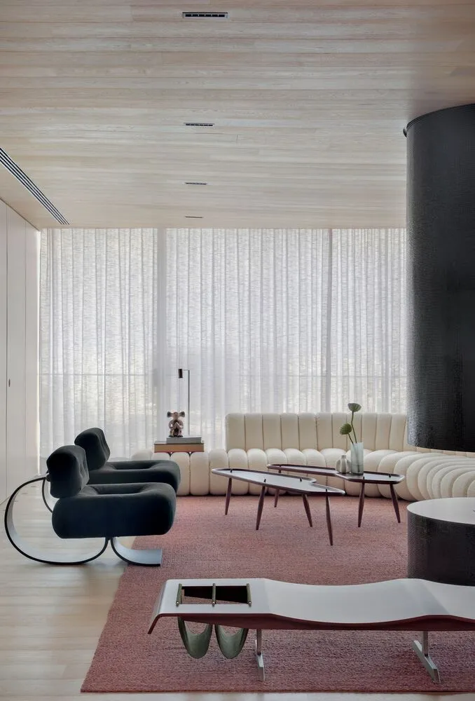 Contemporary living room featuring upholstered furniture and modern design elements.