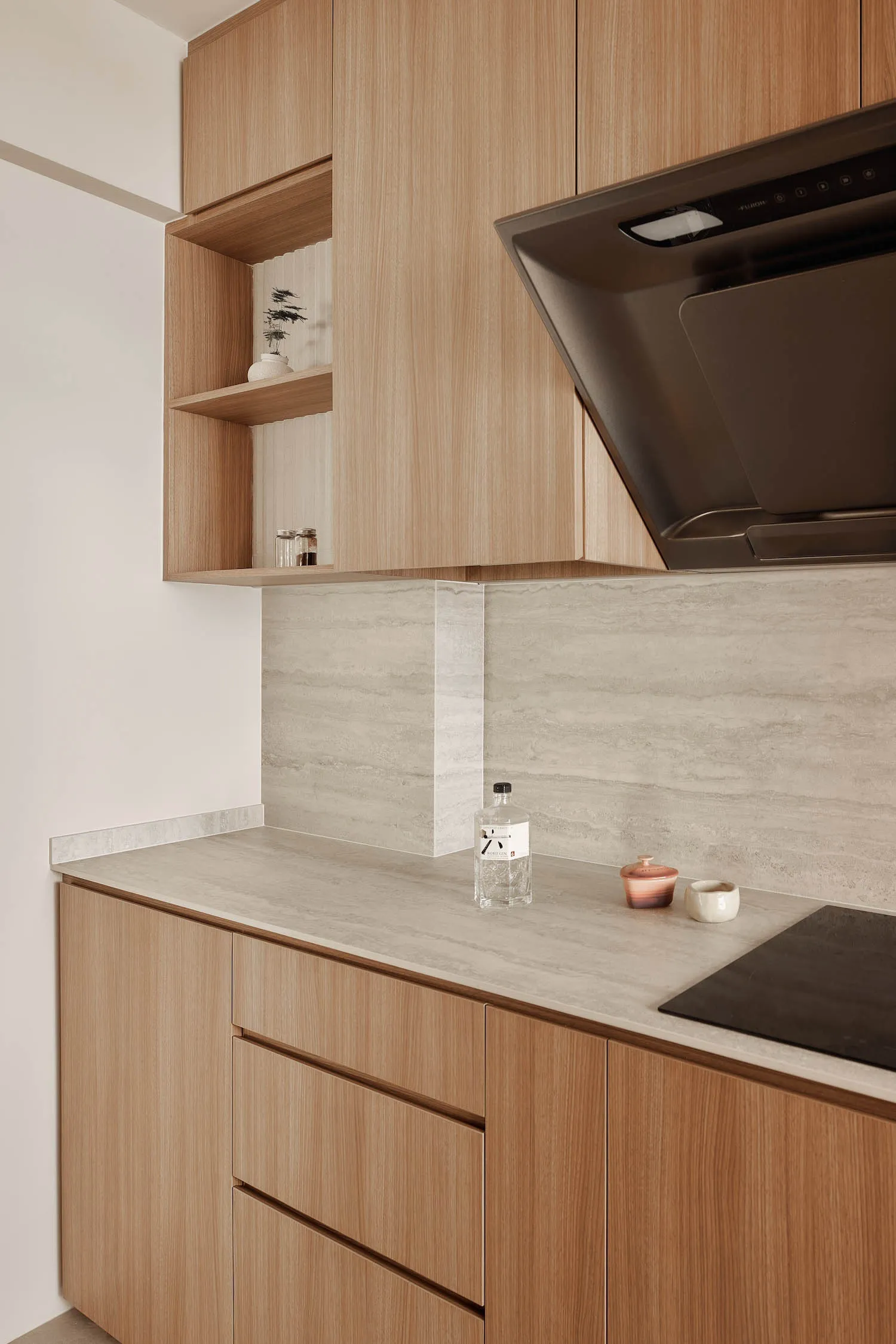 Modern kitchen with concrete countertops and cabinets