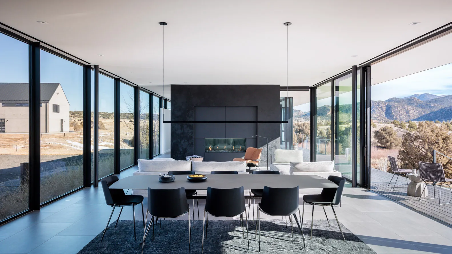 A modern interior design featuring concrete elements, with a clean and minimalist aesthetic.