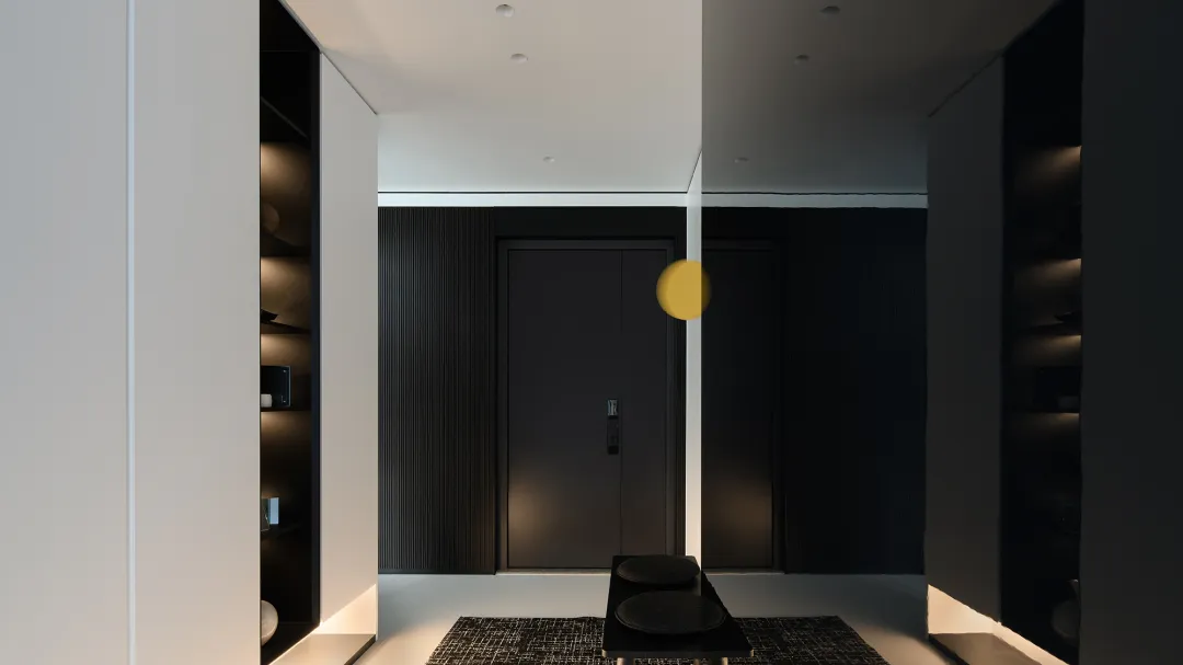 Modern minimalist entrance hall with metal accents, concrete flooring, and concrete lighting fixtures