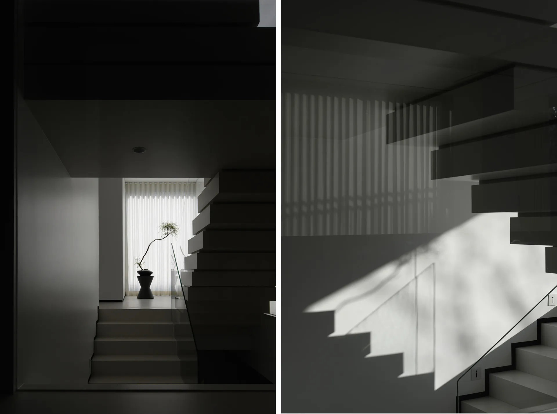 Minimalist interior design featuring modern glass and concrete elements.
