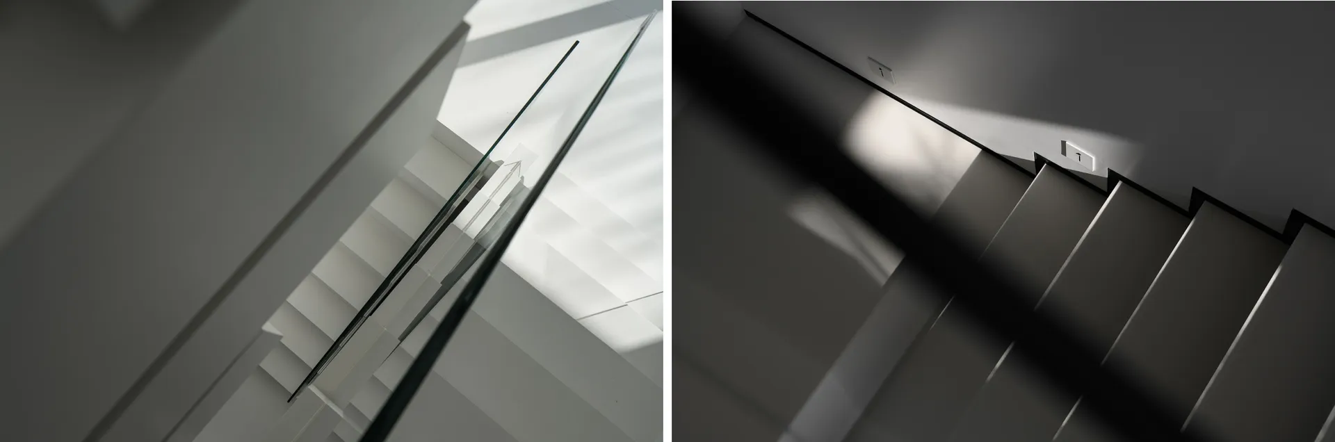 Glass staircase with minimalistic design and white walls