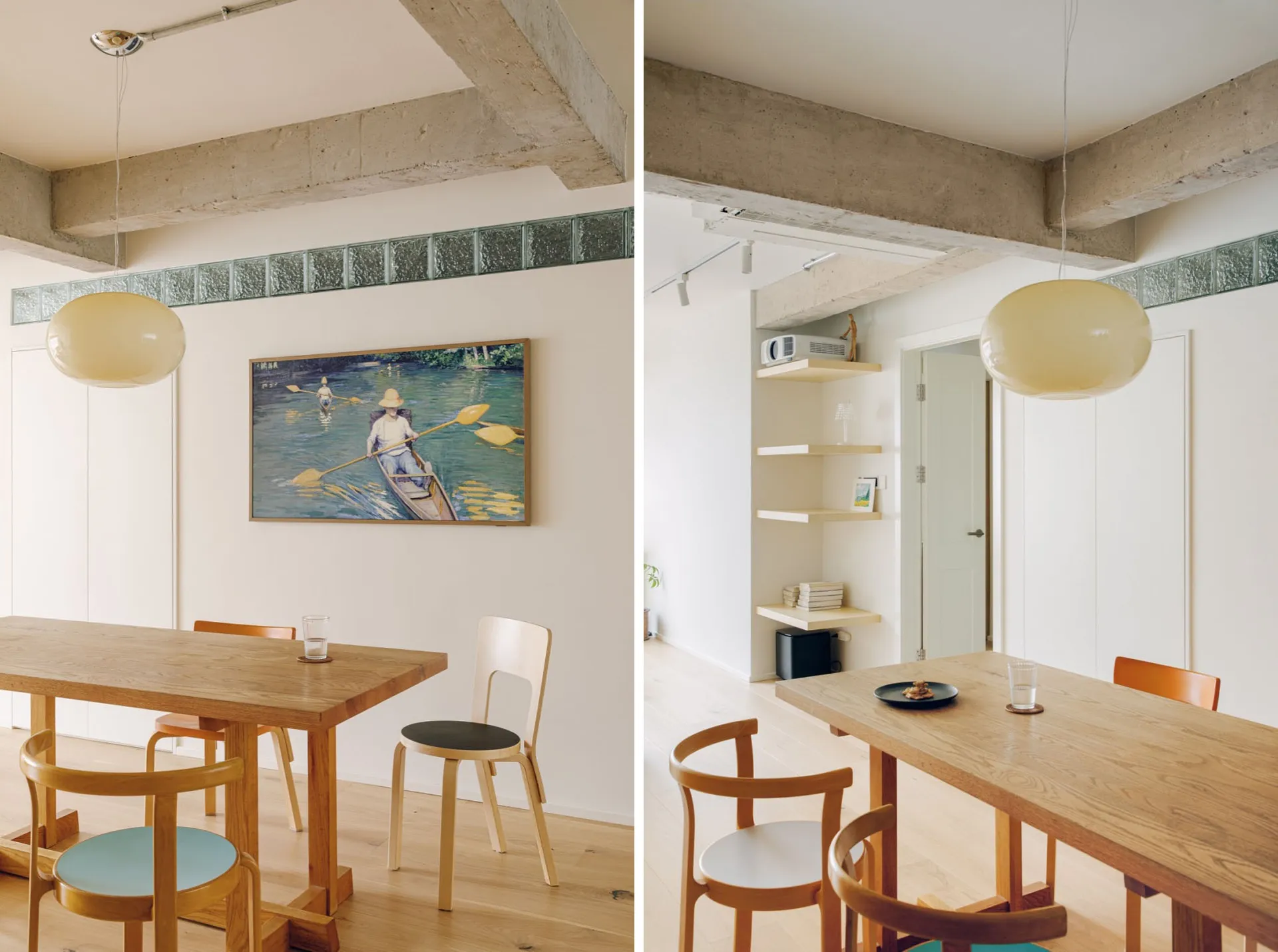 Modern minimalist dining room featuring wooden tables and chairs, concrete walls, and glass decorations.