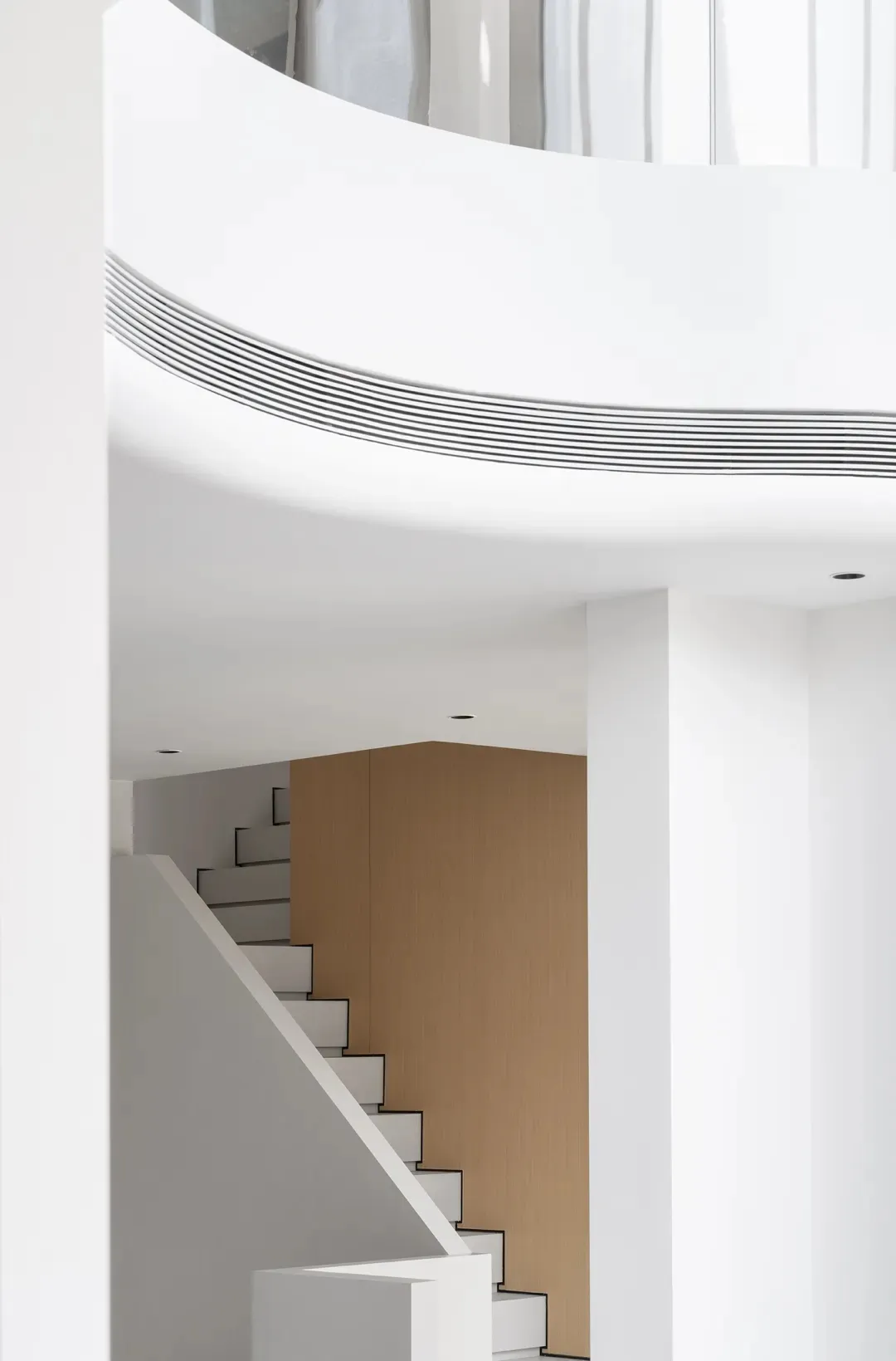 White minimalist interior with white tiles on walls and ceiling.