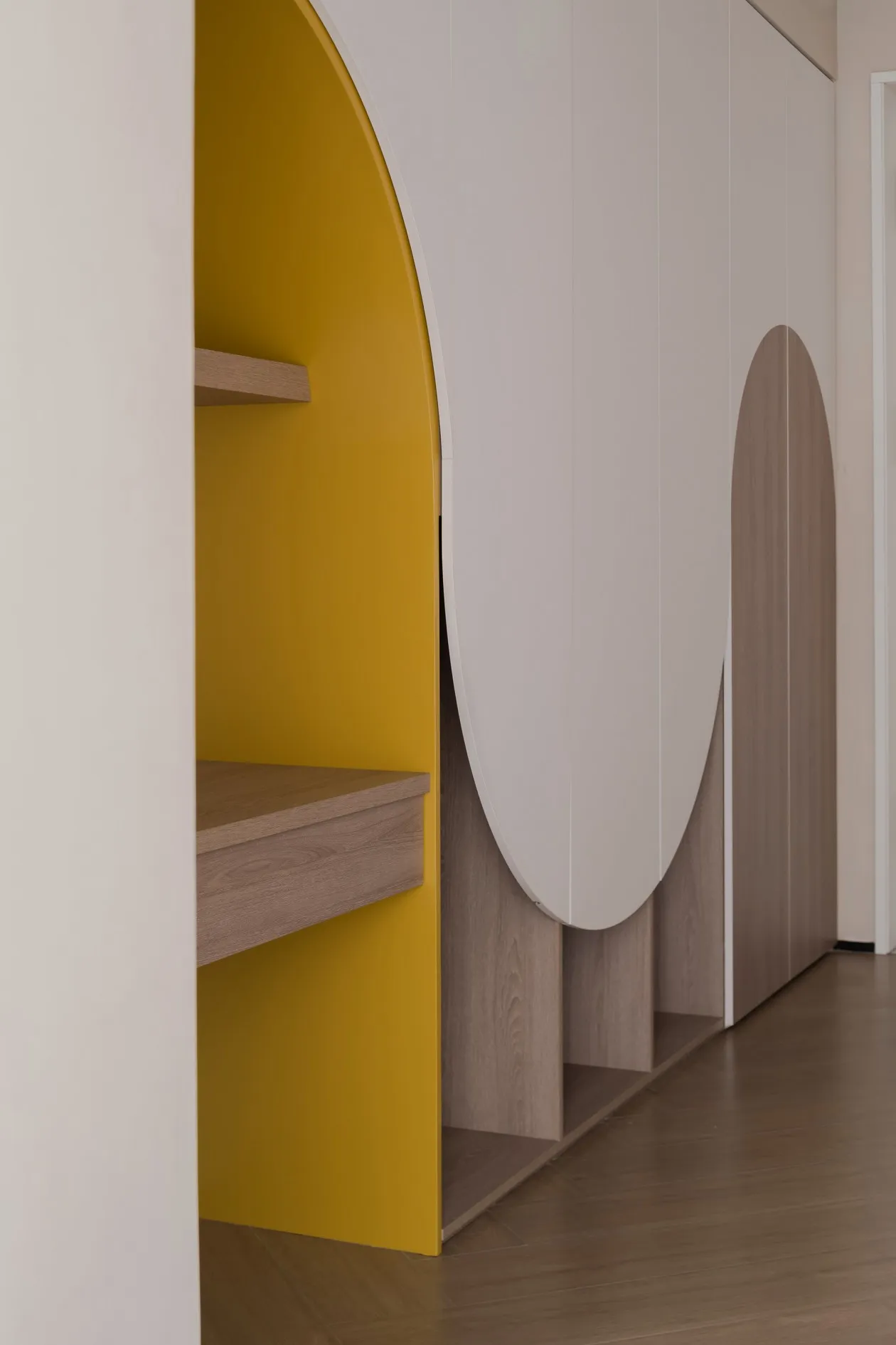 Modern entrance featuring circular openings.