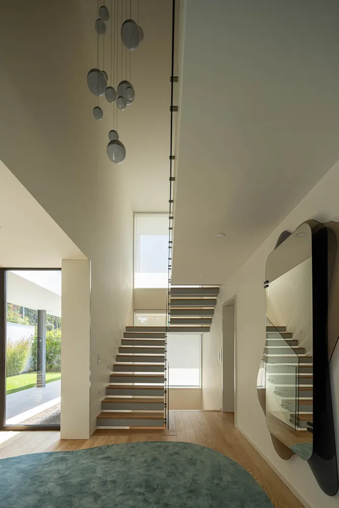 A modern interior featuring glass and wood materials.