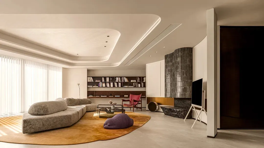 Modern living room with marble accents and wooden flooring
