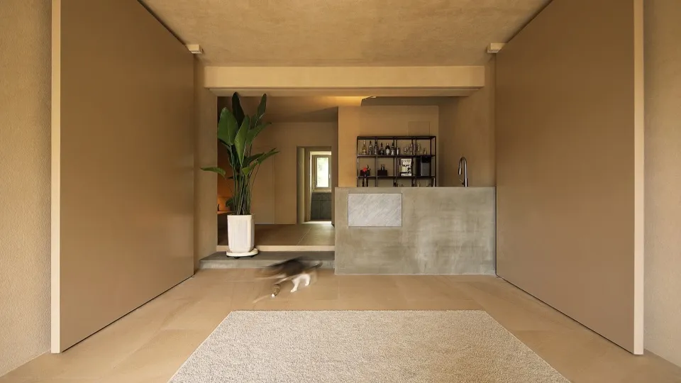 A modern interior design featuring a concrete floor.