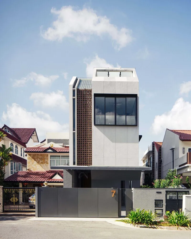 Modern residential exterior with concrete and glass elements