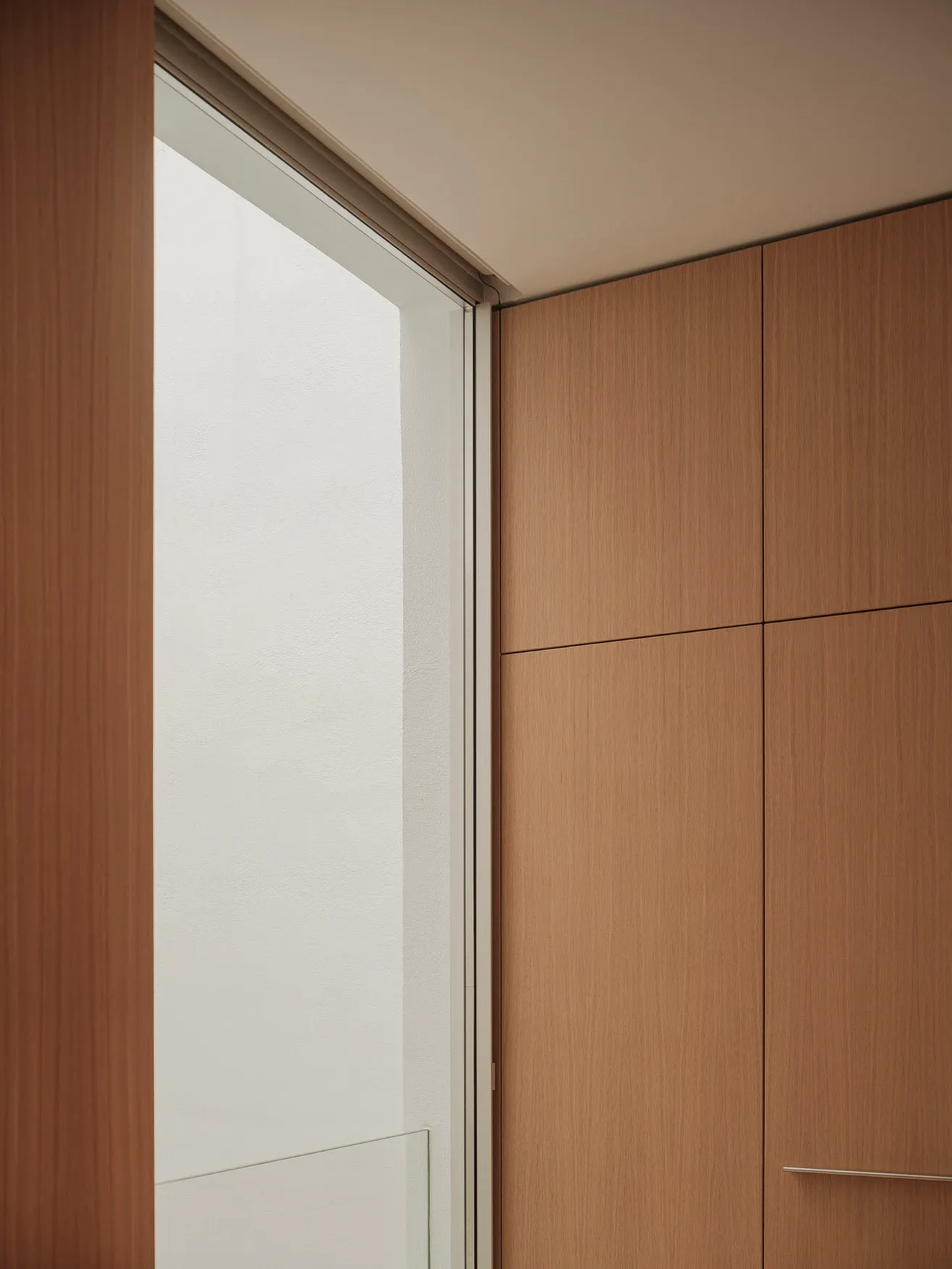 A sophisticated interior design featuring modern wooden panels, suitable for high-end residential or commercial spaces.