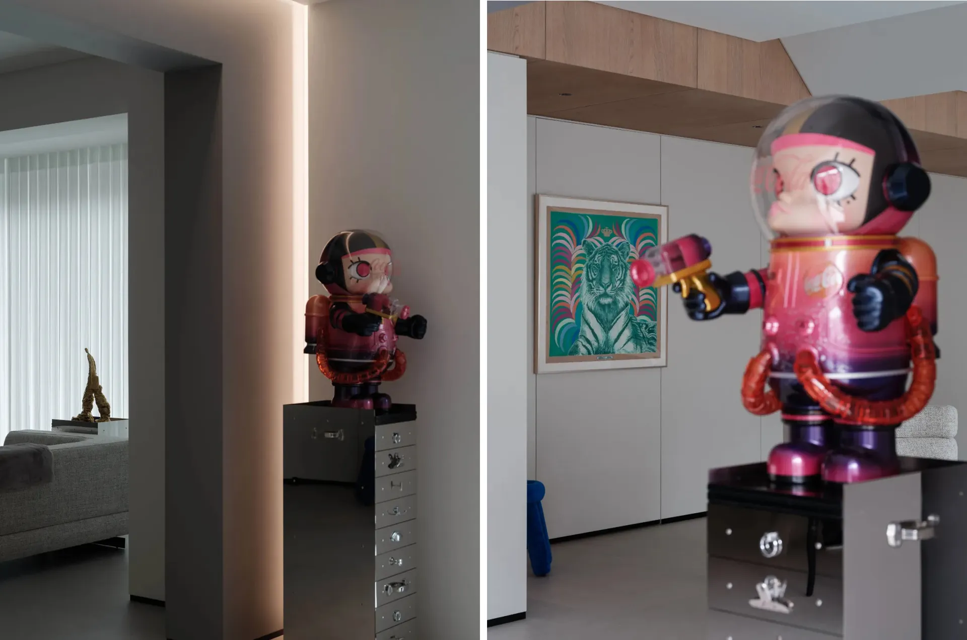 A modern apartment featuring a plastic figurine on a metallic cabinet.