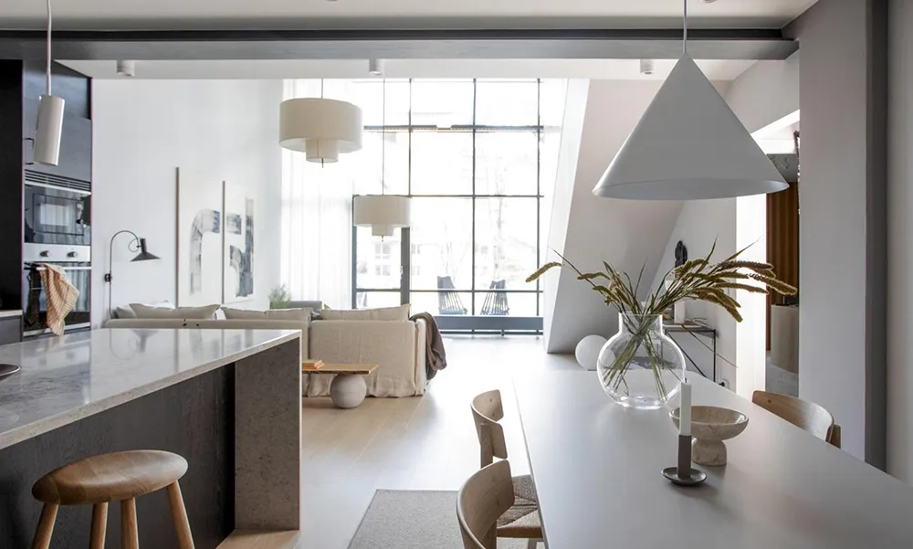 A modern minimalist living room with wood elements, featuring a large window and a sleek, contemporary design.
