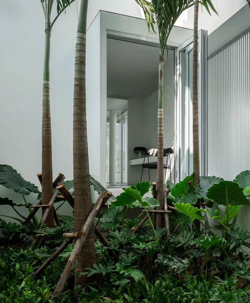 An image depicting a modern office space featuring glass and steel materials.