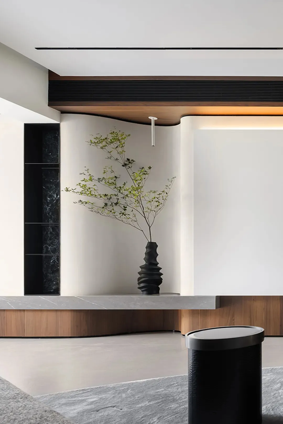 Modern living space featuring a contemporary concrete setting with minimalist design elements.