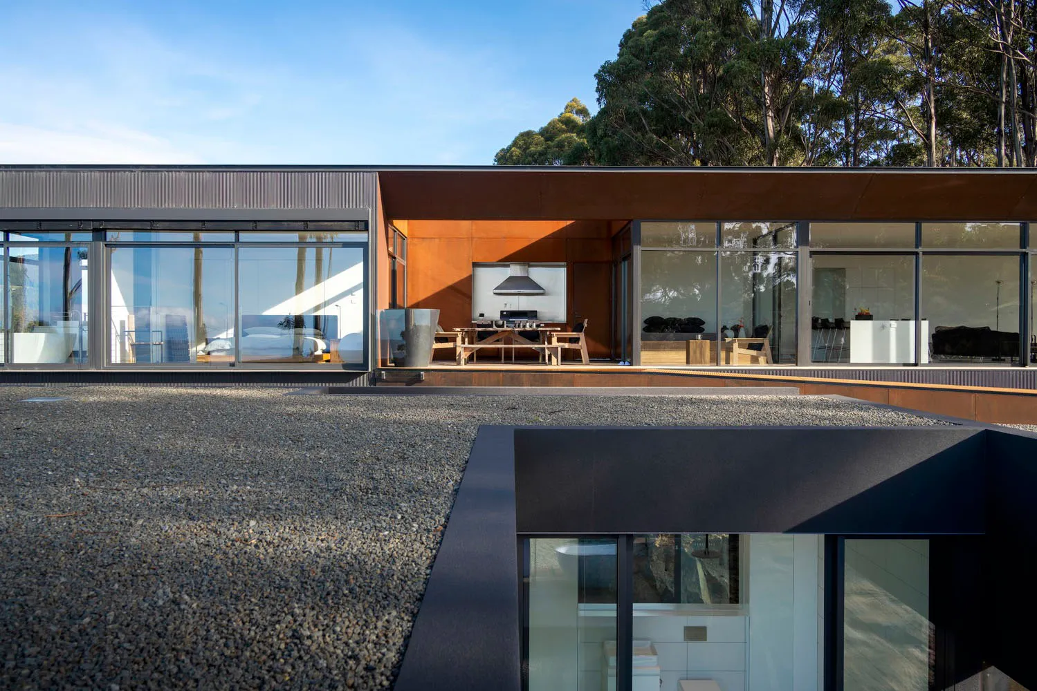Modern residential building featuring metal and glass materials