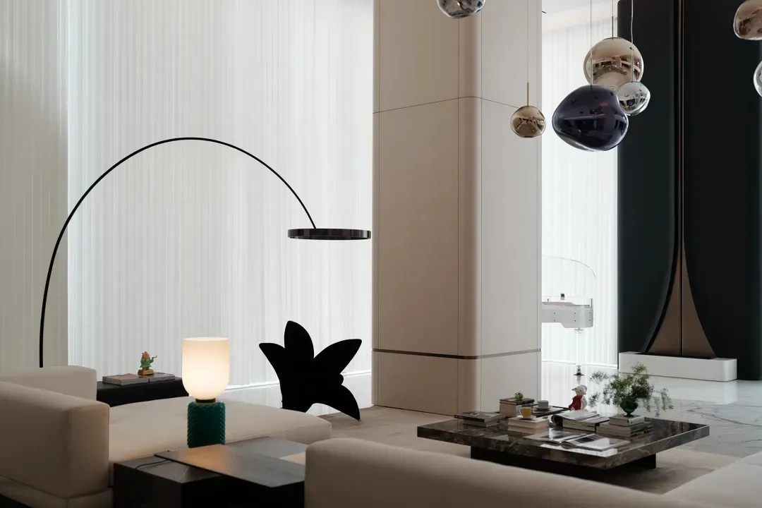 A modern minimalist living space with sleek, contemporary furniture and minimal decor.