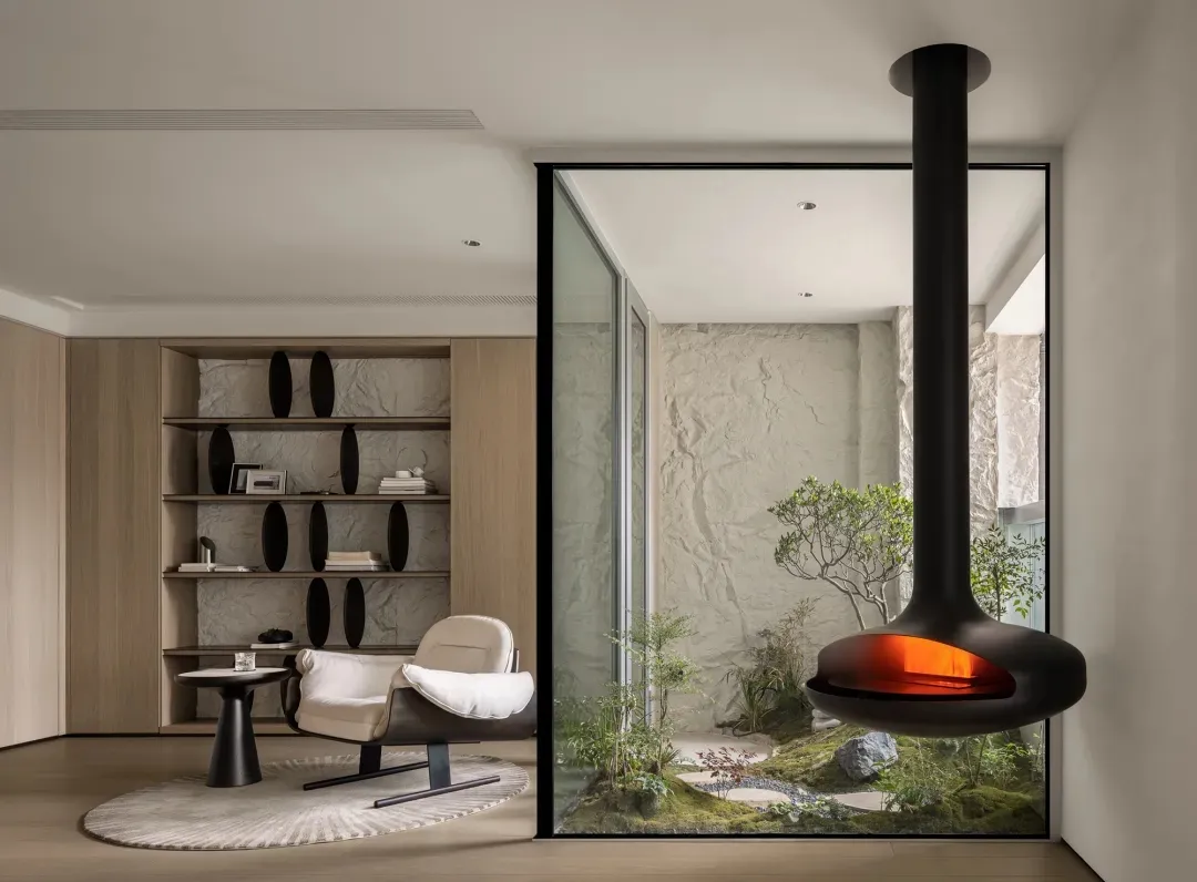 Minimalist living room featuring wood, concrete, and glass elements.