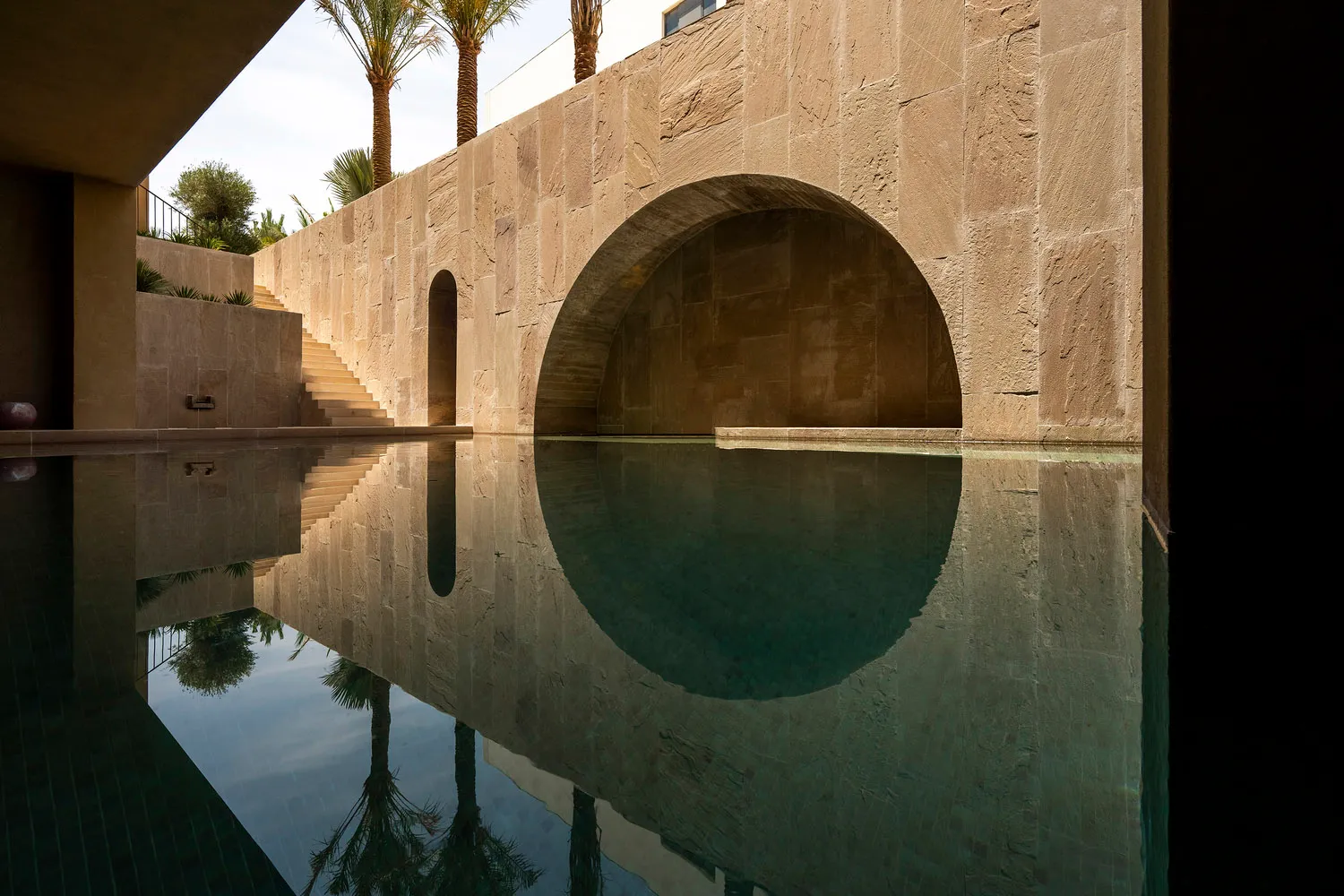 A modern architectural feature constructed of concrete.