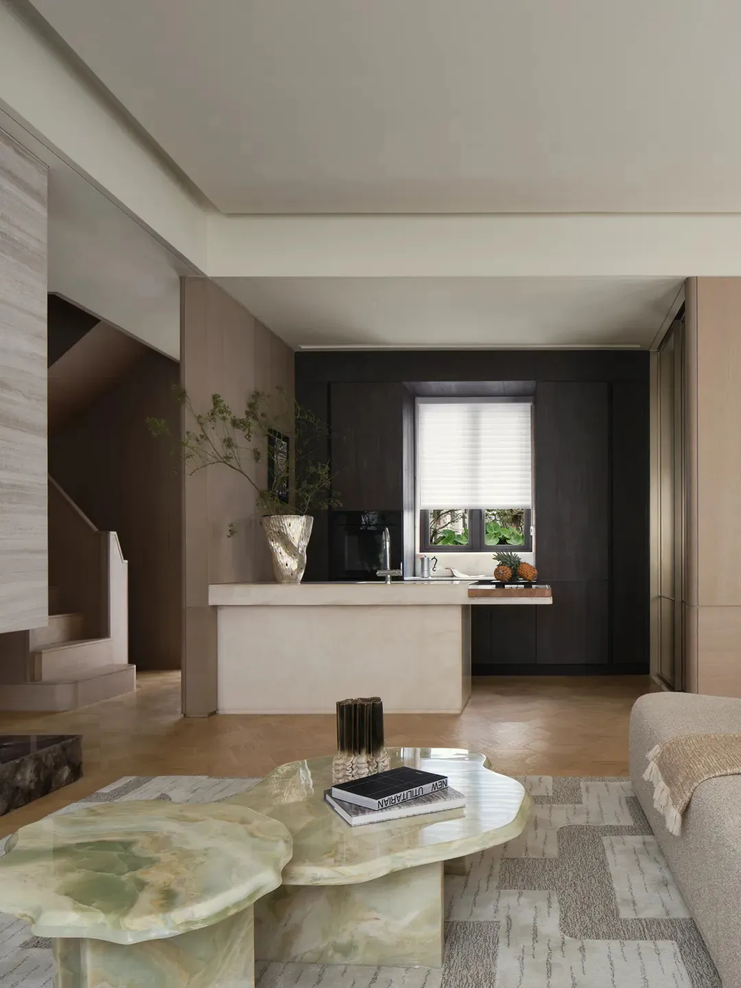 Modern living room with marble coffee table, wooden sofa, and glass window