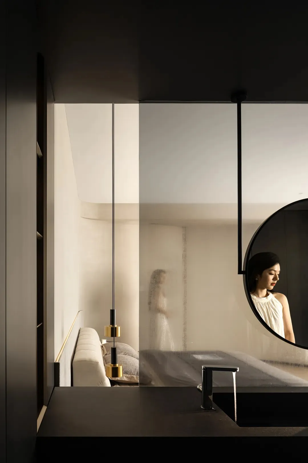 A modern bathroom with a granite countertop and faucet.